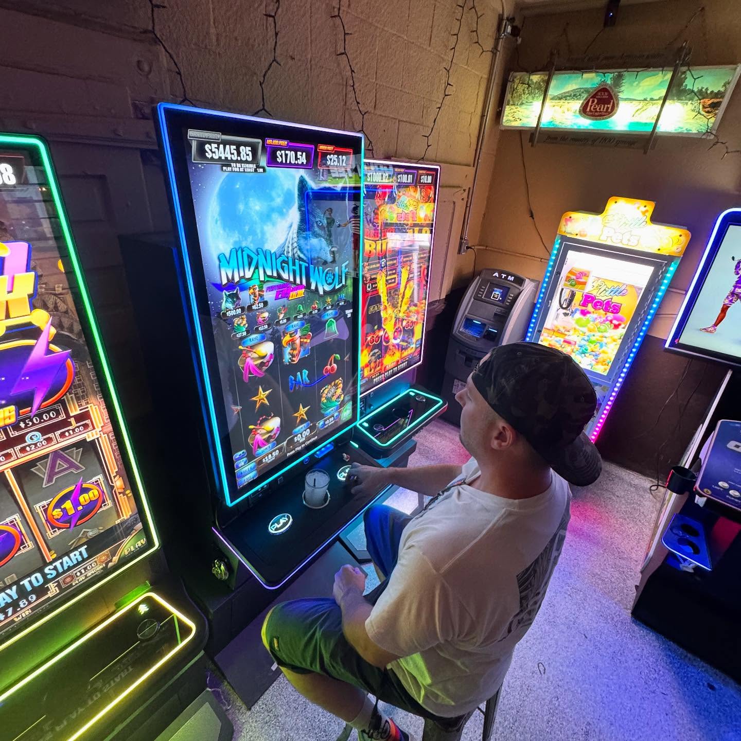 Patron playing arcade games at Bruno's
