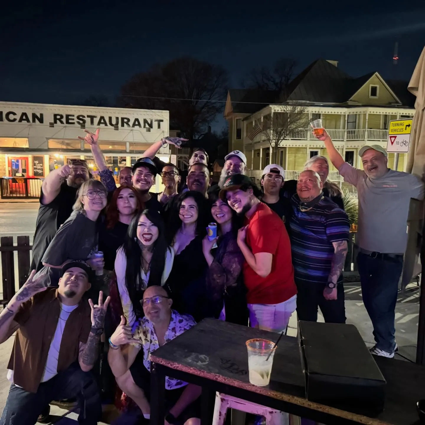 Group of friends celebrating at Bruno's corner patio